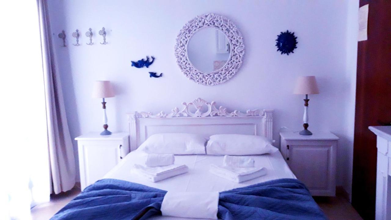 Christos Rooms Palaiochora Bagian luar foto